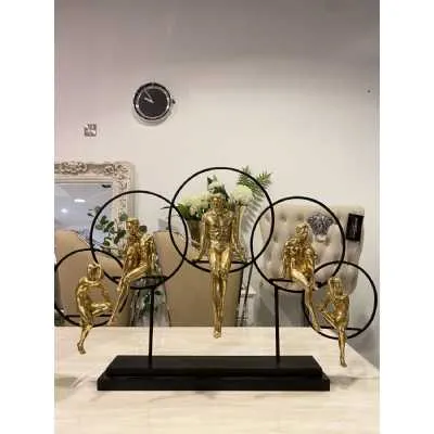 Gold 5 Men Circle Sculpture